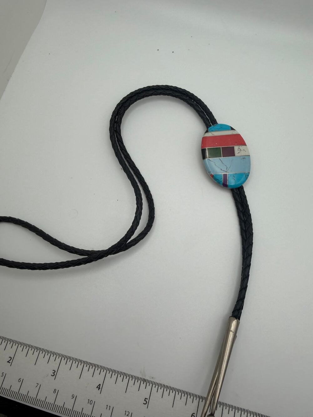 Southwestern-style multi-stone inlay bolo tie